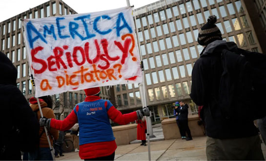 America, Seriously? a dictator? Protest sign.