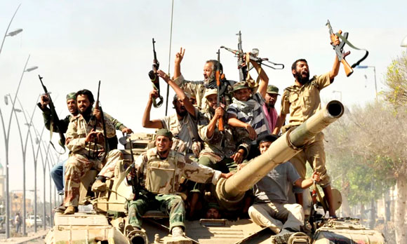 Gaddafi Captured - Soldiers raise guns in the air - Vine Prediction True